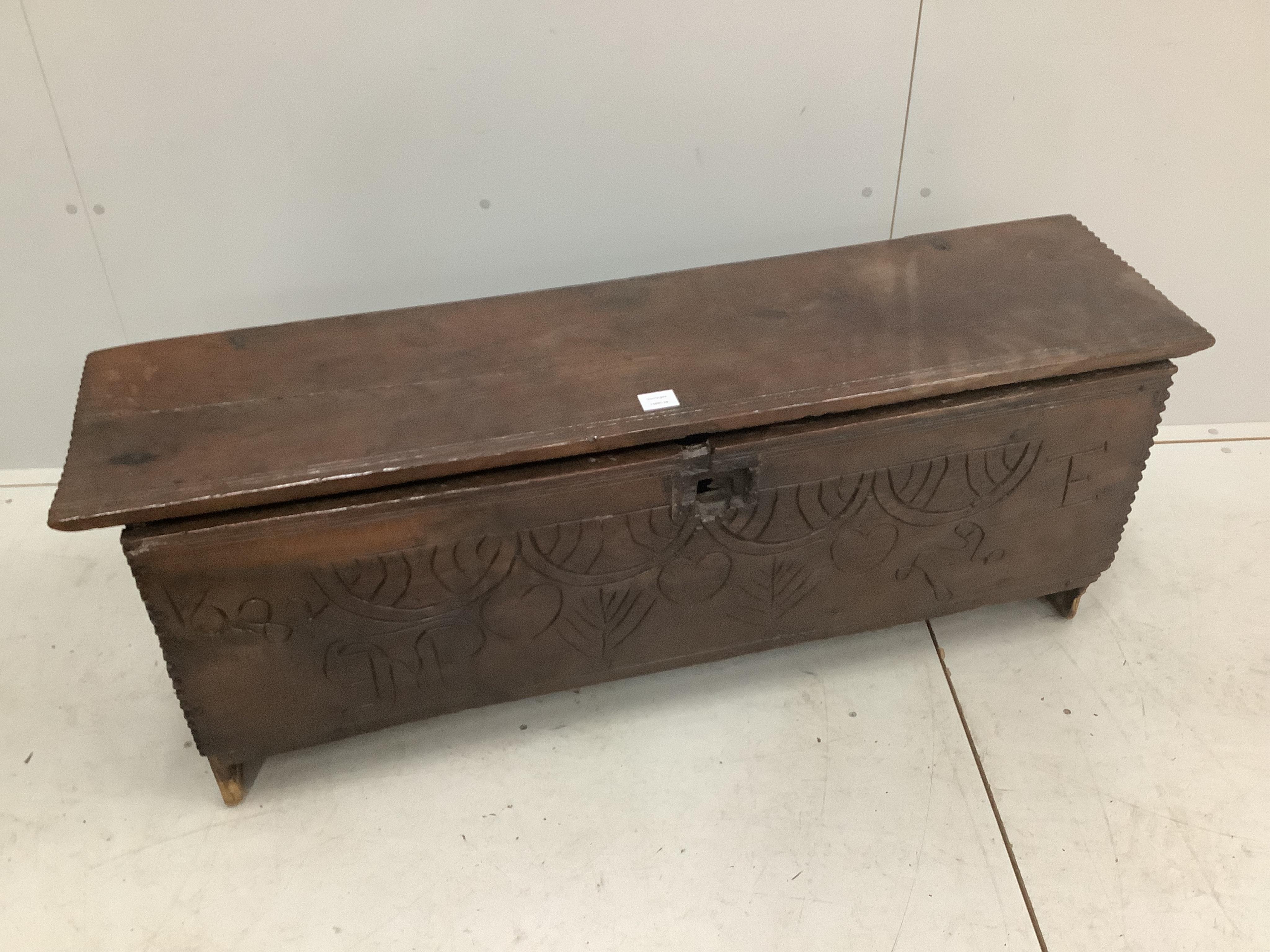 A 17th / 18th century oak coffer, width 129cm, depth 34cm, height 49cm. Condition - poor